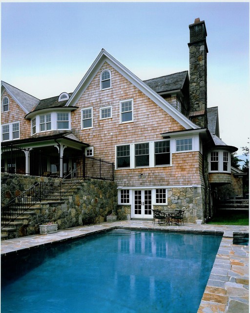 Прекрасный дизайн экстерьера  дома с большим бассейном